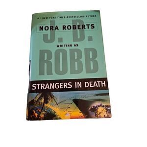 Strangers in death by Nora Roberts large print edition Putnam isbn 978-0-7394-92